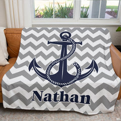 Overhead presentation displaying the complete nautical anchor bedding set composition and chevron line art.