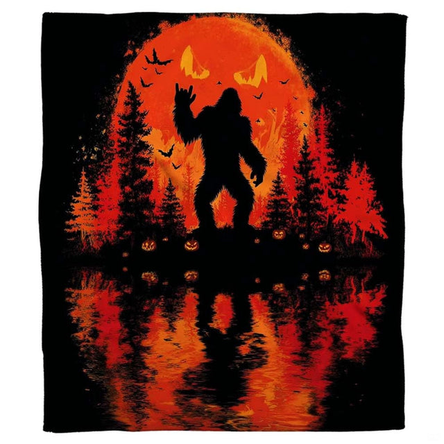 Halloween Bigfoot throw blanket view 2 highlighting jack o lantern harvest moon, carved pumpkins, and lake reflections