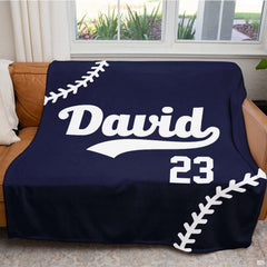 Athletic inspired bedroom focal accent with white varsity numbers against rich midnight blue.