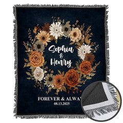 Folded autumn floral throw blanket showing decorative fringe edges and crisp botanical printing