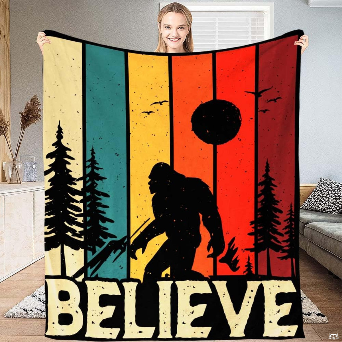 Retro sunset striped silhouette of Bigfoot walking in forest with believe text, view 1.