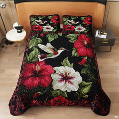 Overhead view of tropical hummingbird and hibiscus floral bedding design