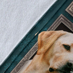 Close-up detail shot of the Yellow Labrador Retriever blanket showing edge detail and teal snowflake art.