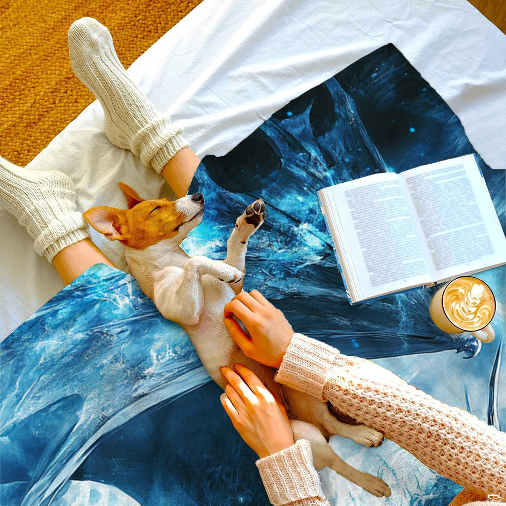 Glacial ice dragon throw blanket styled in a cozy lifestyle bed setting