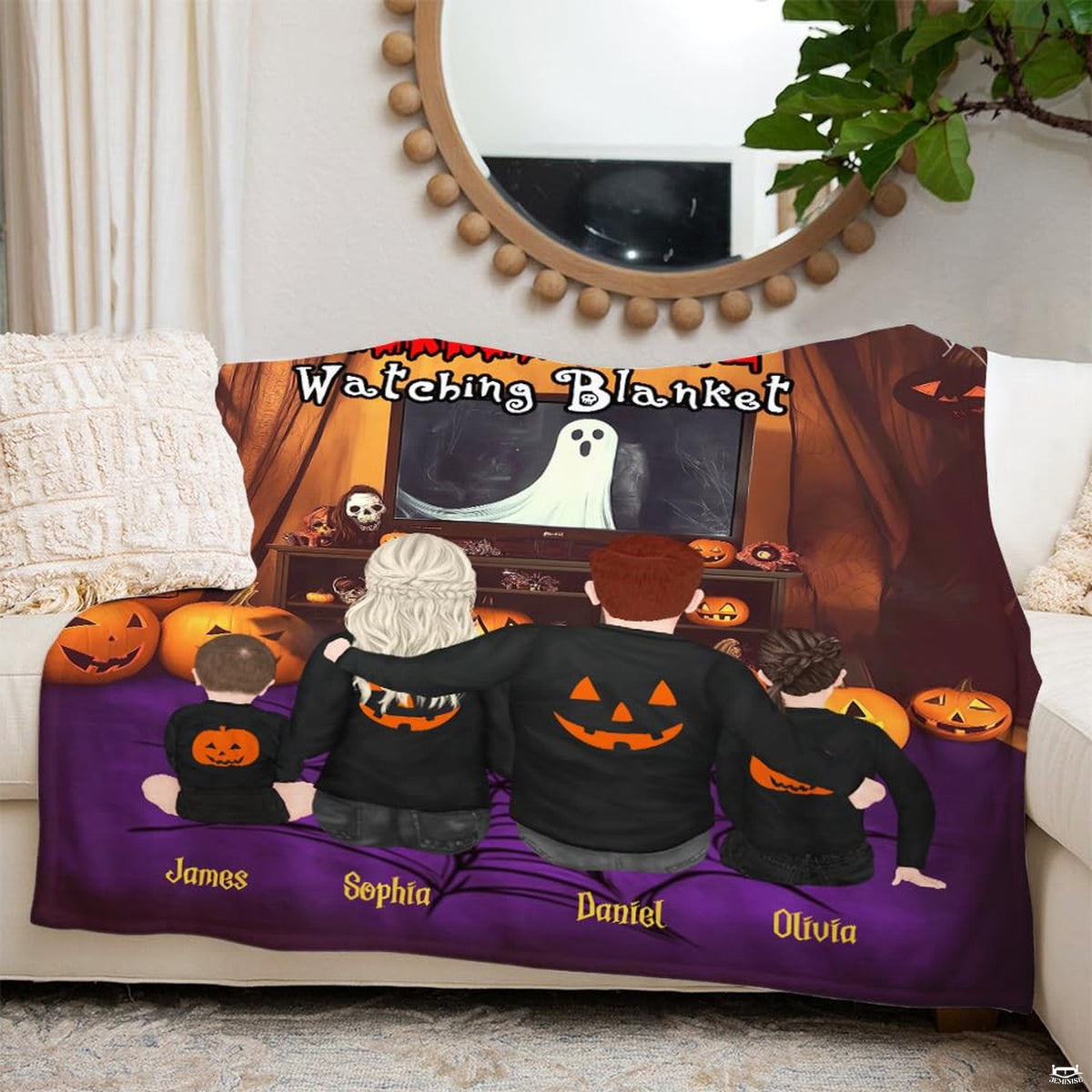 Close view of family in pumpkin shirts, television ghost, and carved pumpkins