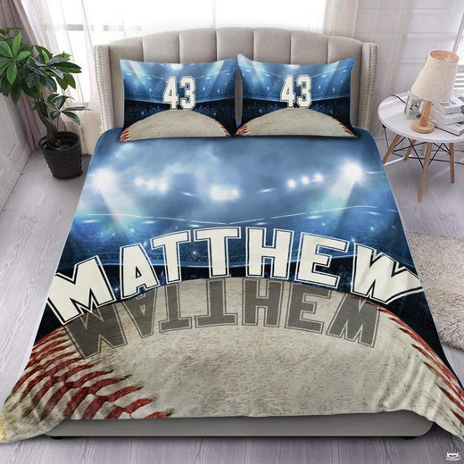Baseball field bedding set displaying night stadium floodlights and athletic jersey typography.