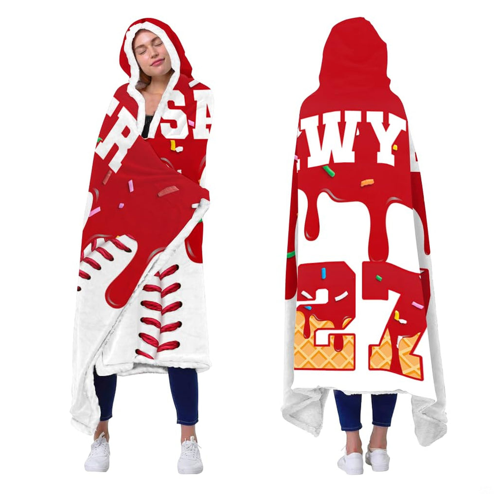 Melting red baseball hooded blanket draped on living room armchair