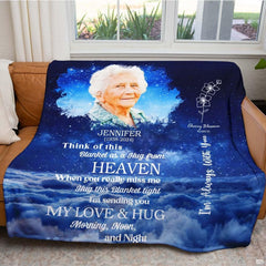 Heartfelt elder tribute design with swirling indigo clouds and floral line art resting on indoor home seating