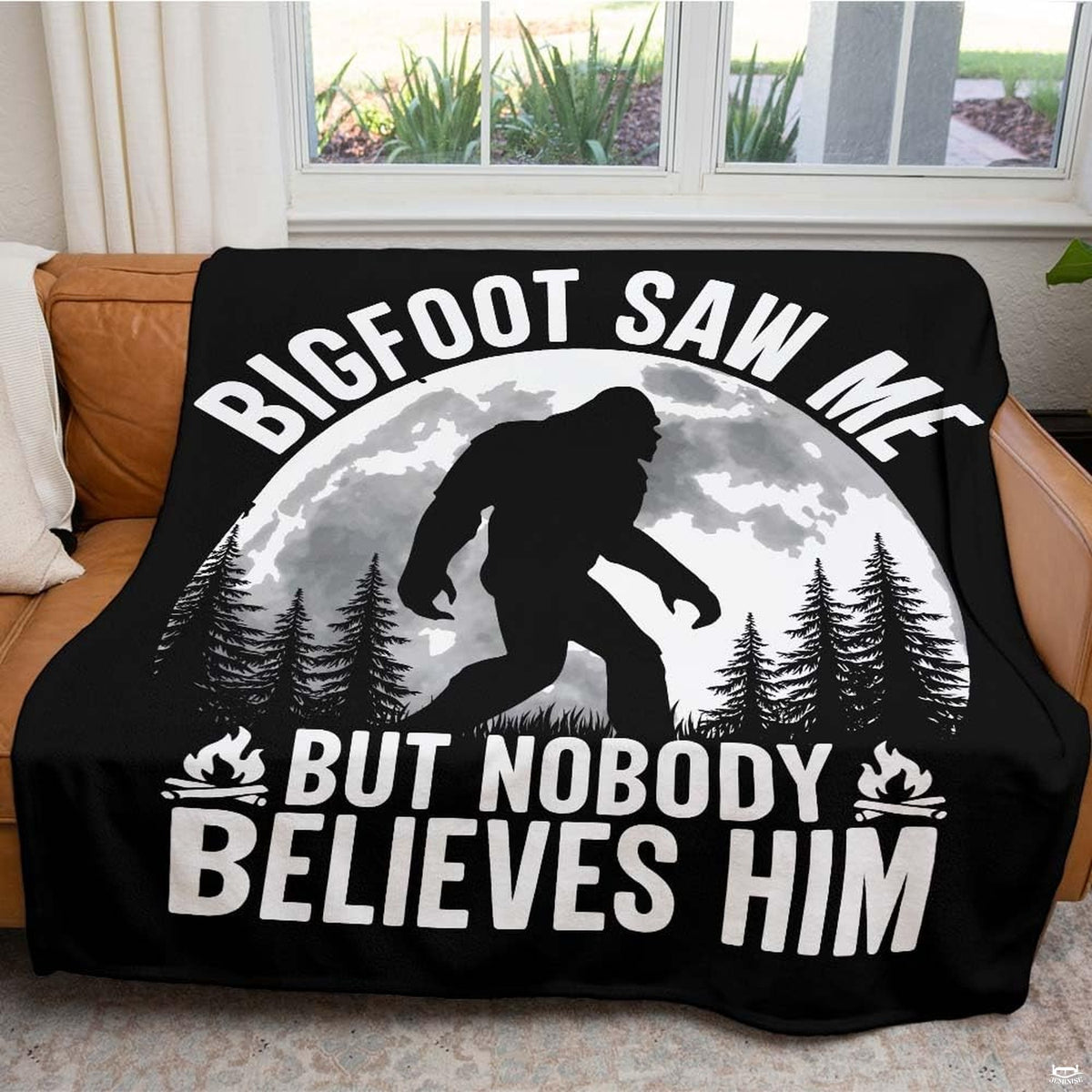 Close up of nocturnal Bigfoot throw blanket highlighting cloudy full moon and evergreen pine tree details