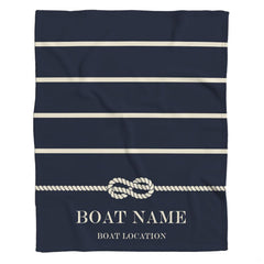 Navy coastal bedding showcasing ivory horizontal bands on a midnight ocean backdrop.