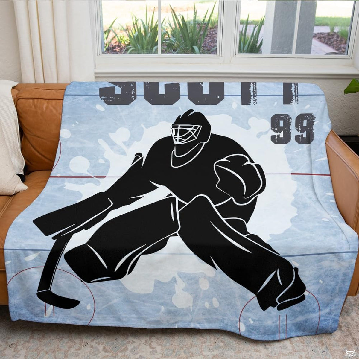 Close up shot showing fine graphic details and white underside of hockey goalie blanket.
