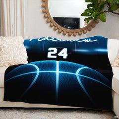 Folded corner of neon blue basketball throw blanket showing bright cyan details