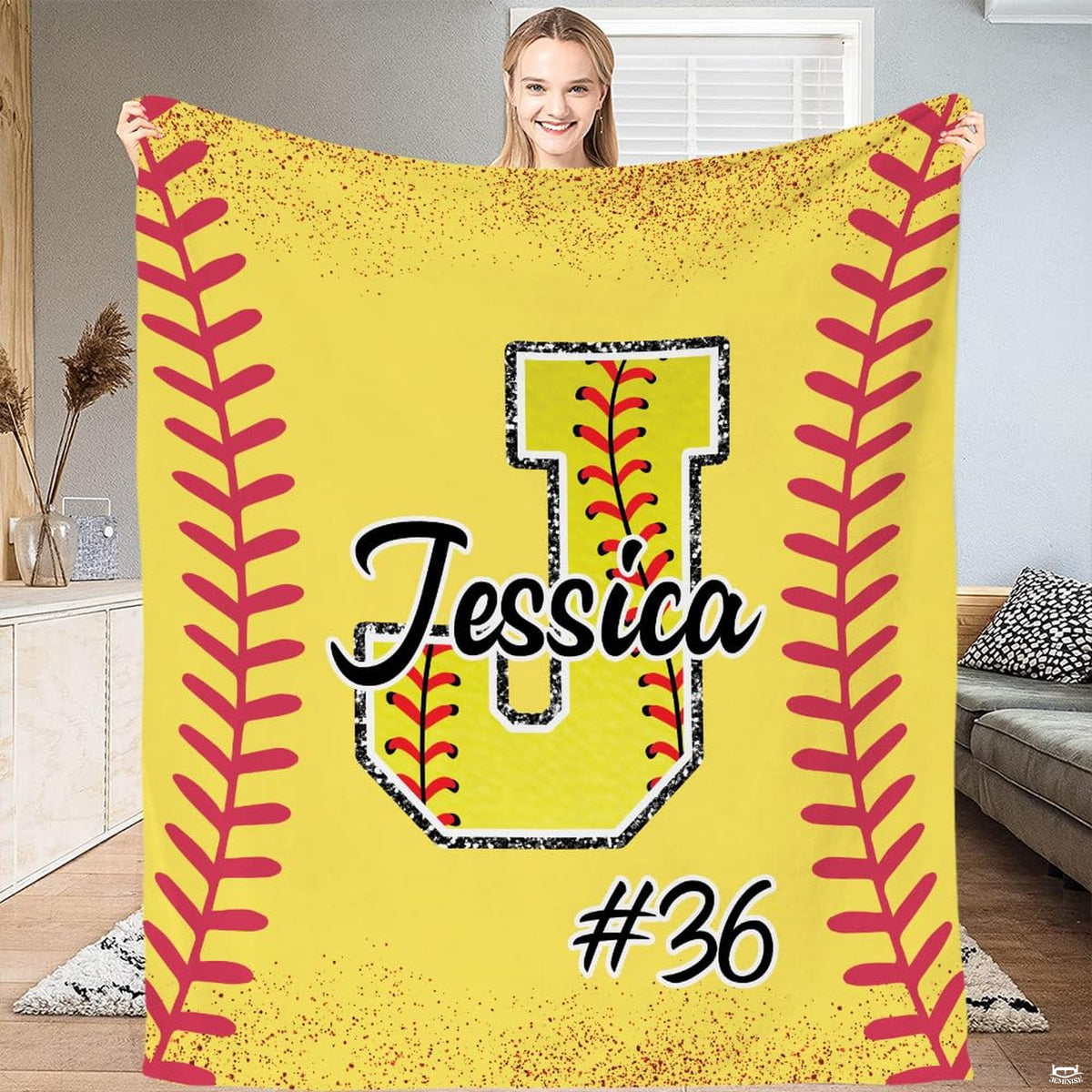 Softball athletic graphic blanket draped over living room armchair