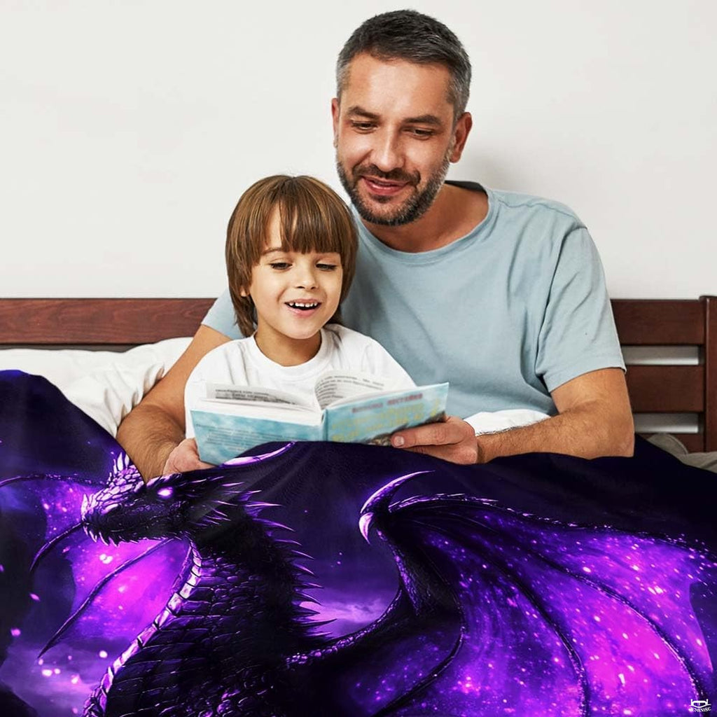 Neatly folded purple galaxy dragon throw blanket highlighting precise edge hem stitching and vibrant art print.