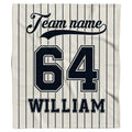 Classic baseball jersey aesthetic with navy pinstripes and bold athletic block numbers displayed on bed.