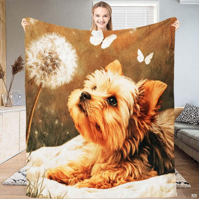 Yorkshire Terrier dog gazing up at white butterflies and a dandelion seed head throw blanket