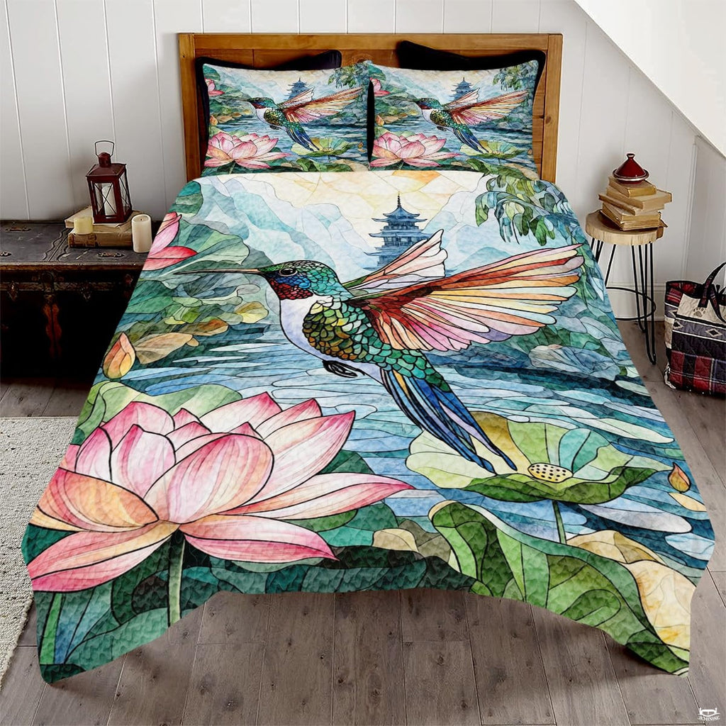 Stained glass illustration of a colorful hummingbird over blooming pond flowers and distant pagodas.