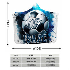 Artistic soccer ball illustration and typography on bedding set paired with sleek wood furnishings.