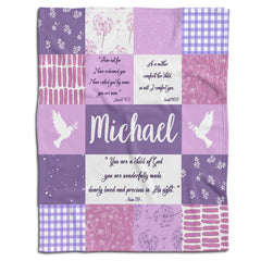 Frontal display of lavender patchwork pattern with white peace doves and dandelion motifs.