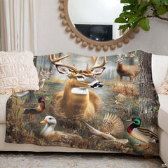 Rustic forest wildlife blanket styled on a living room couch under a circular mirror