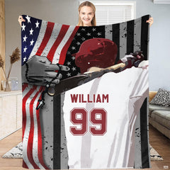 Baseball batter in hitting stance before American flag with jersey typography, view 2.