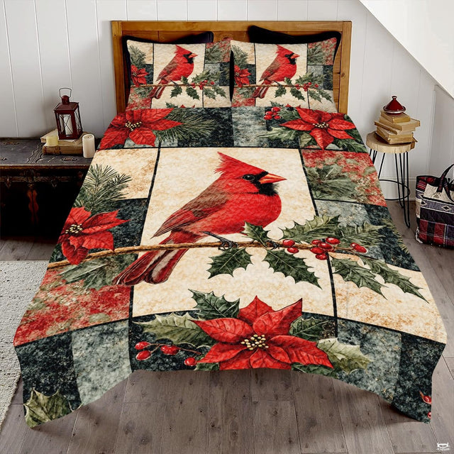 Winter bird bedding artwork featuring crimson cardinals, evergreen boughs, and holiday poinsettia blocks.