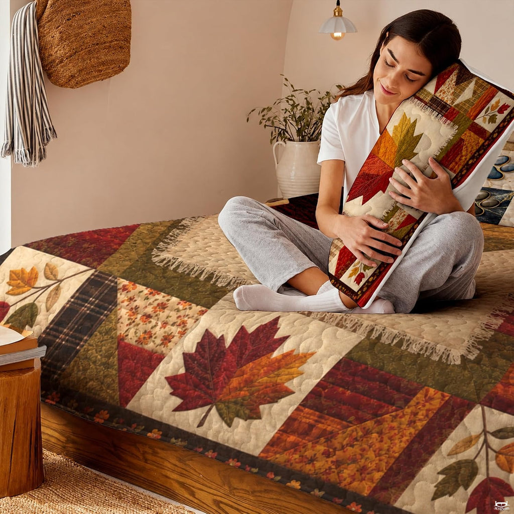 Full room display of patchwork maple leaf bedding set styled in an inviting country farmhouse bedroom