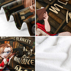 Person holding open the angel wings memorial blanket showing full celestial artwork.