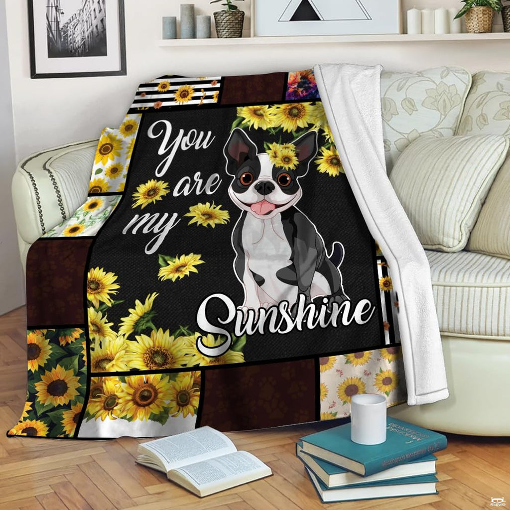 Illustrated bulldog pup artwork with blooming sunflowers and patchwork paw print borders.
