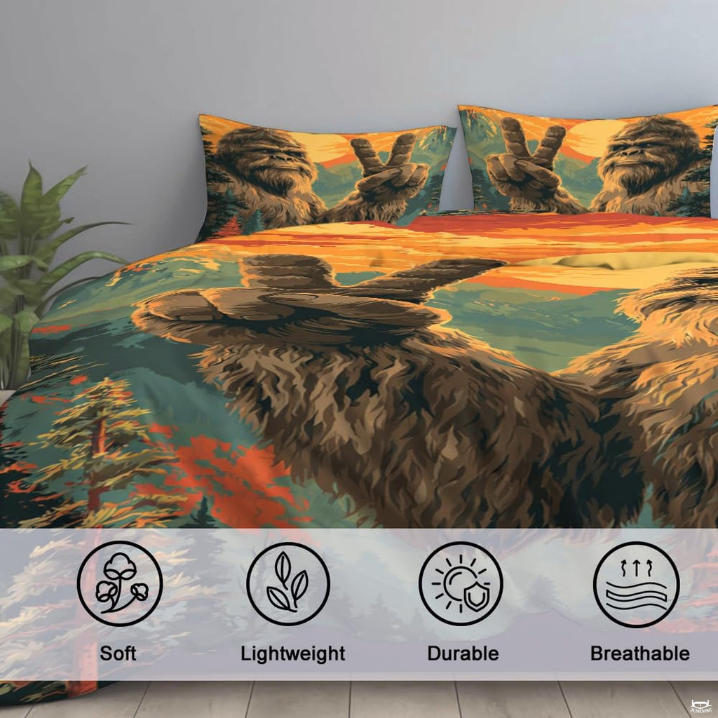 High-angle view of bigfoot graphic bedding showing rich forest green, ochre, and deep bark tones across bed.