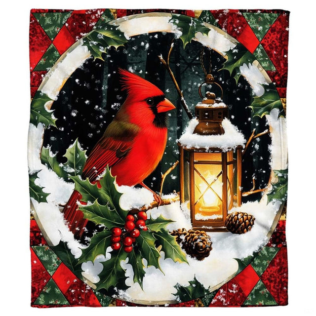 Close-up of red cardinal, vintage lantern, snowy branch, and pinecone artwork on seasonal christmas bed covers.
