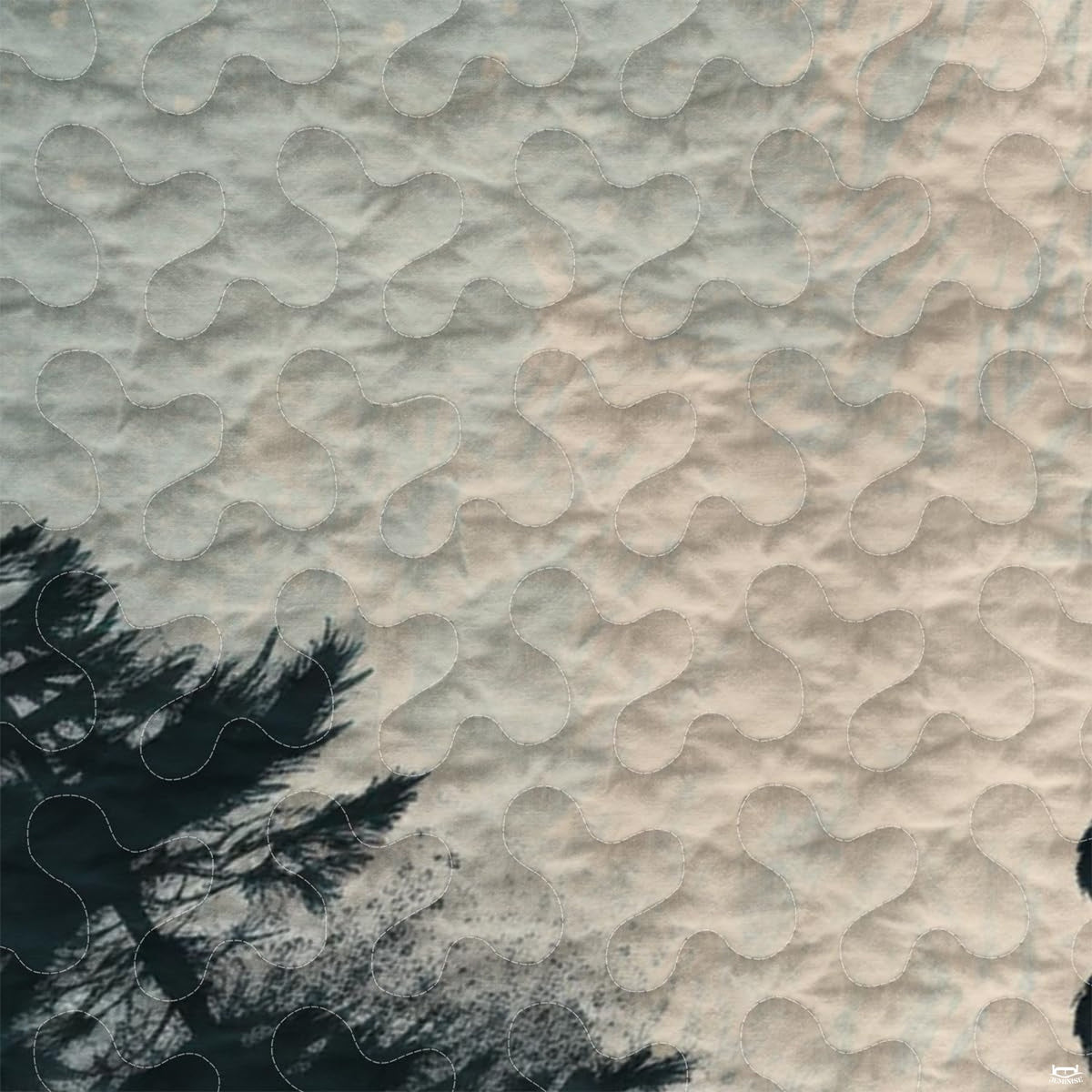 Close-up view of Bigfoot bedding showcasing sage eucalyptus pine trees and Sasquatch silhouette artwork