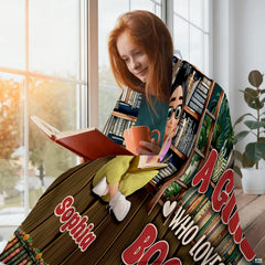 Library ladder bookshelf throw blanket draped over a living room sofa creating a scholarly room accent.