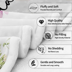 Airy off-white bedroom styling highlighting botanical garden illustrations across the bed top.