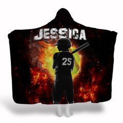 Front display of female softball batter standing before a fiery flaming softball graphic on black background.