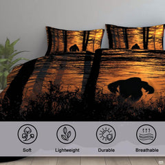 High-angle view of bigfoot graphic bedding showing rich marigold, amber, and mocha tones across bed.