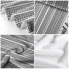 Optical illusion throw blanket folded neatly on wooden bench displaying crisp monochrome print