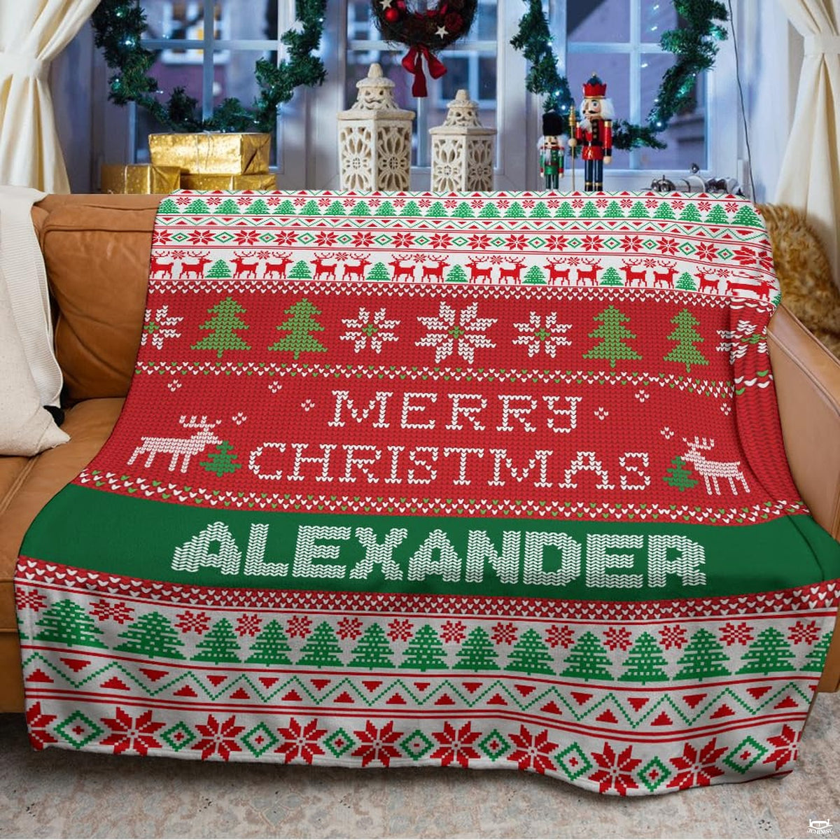 Ugly sweater holiday graphic blanket styled across bedroom bed