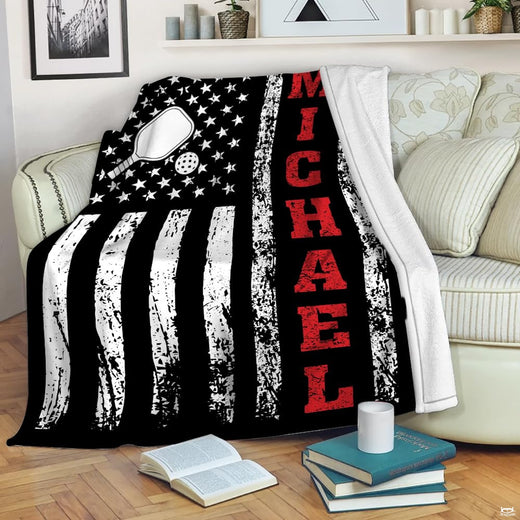 Distressed American flag graphic with pickleball paddle and red lettering, view 1.