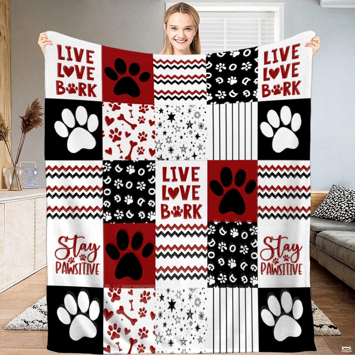 Dog paw print bedding set featuring red, black, and white patchwork grid collage artwork with bone and heart motifs.