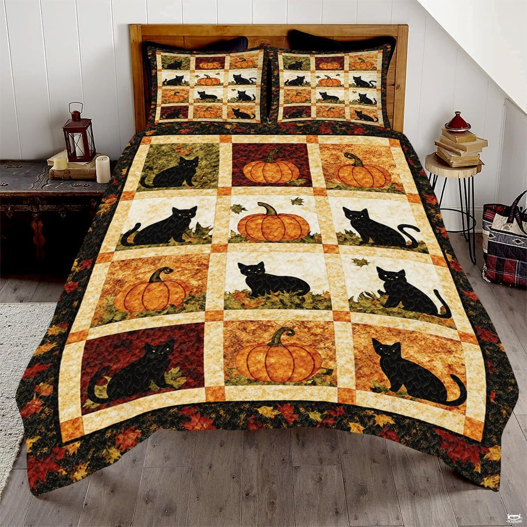 Charcoal slate and pumpkin autumn leaf bedding set featuring harvest pumpkins and foliage in bold patchwork tiles.