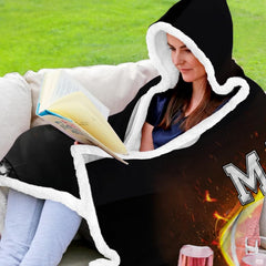 Folded flaming football helmet stadium throw blanket revealing deep black and bright flame graphics