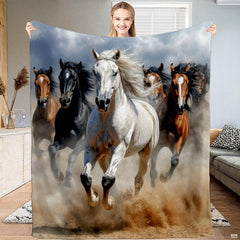 Galloping wild horses throw blanket featuring a white stallion leading a herd through rising dust.