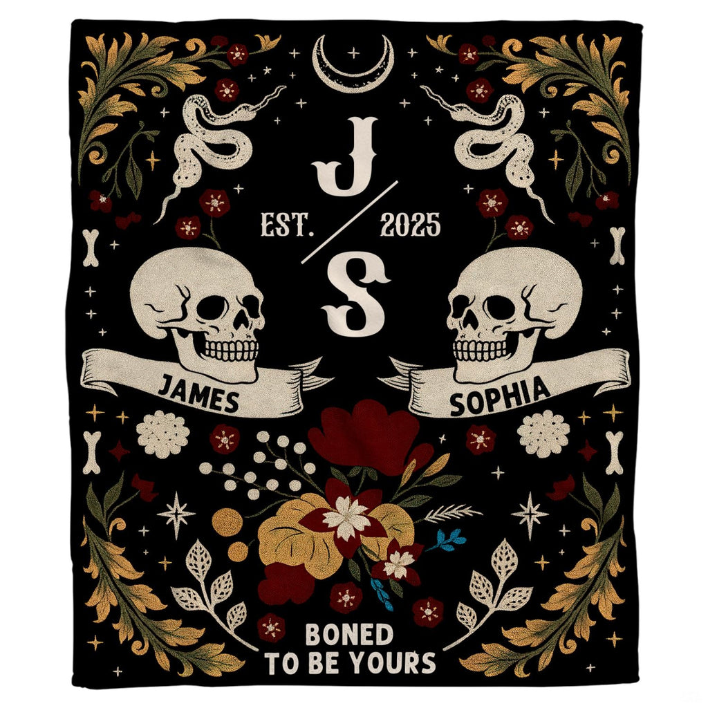 Close-up view of skull detailing, curling ribbon banners, and celestial crescent moon.