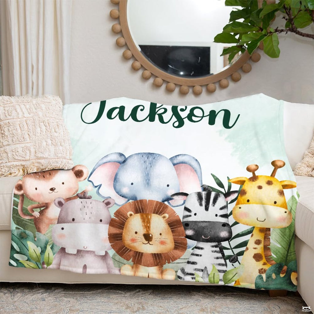 Watercolor safari animals blanket arranged neatly on living room couch beneath mirror.