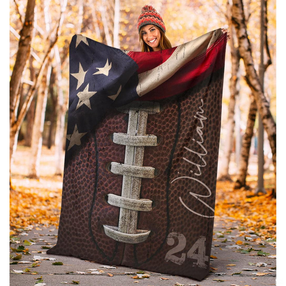 Folded athletic blanket highlighting rustic laces and flag stars