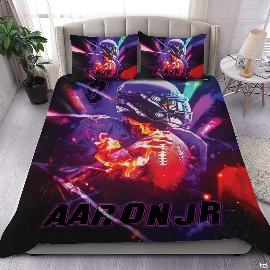 Royal purple football sports bedding featuring a textured football graphic and amethyst yard lines on a bed