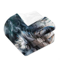 Folded bedding with teal brushwork, pale wolf fur, feathers, and white reverse