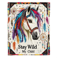 Boho tribal feathers horse throw blanket styled smoothly across contemporary bed