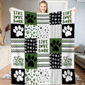 Dog paw bedding set featuring an olive green, black, and white patchwork grid motif with stars and chevron artwork.